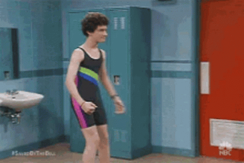 Man In Bathing Suit By Locker GIF