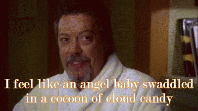 Man in Bathrobe Saying I Feel Like an Angel Baby Swaddled in a Cocoon of Cloud Candy