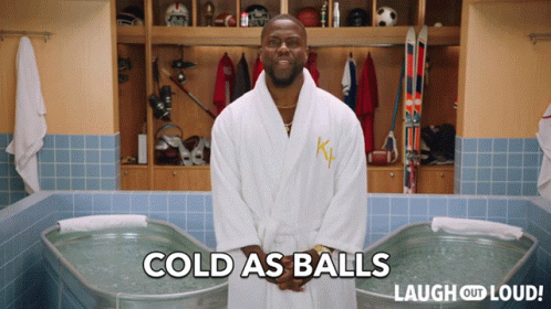 Man in Bathrobe Standing in Front of Bathtub Cold as Balls