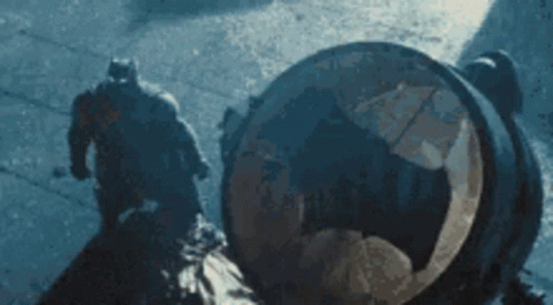 Man In Batman Costume Walking GIF