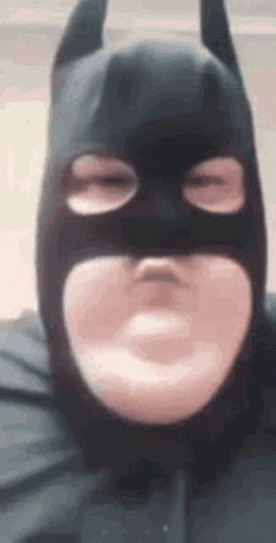 Man in Batman Mask Making Funny Face