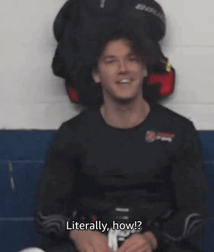 Man in Bauer Jersey in Locker Room