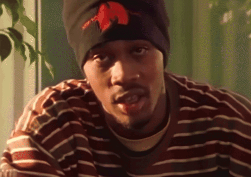 Man in Beanie and Striped Shirt with Red Circle