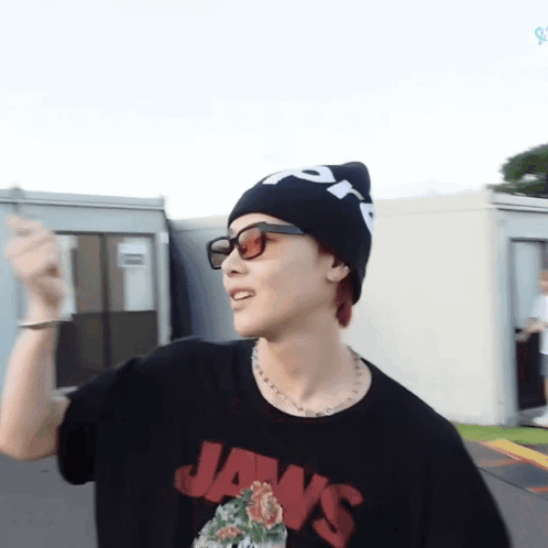 Man in Beanie and Sunglasses Wearing Jaws T-Shirt