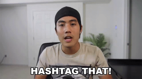 Man in Beanie and T-Shirt Saying Hashtag That