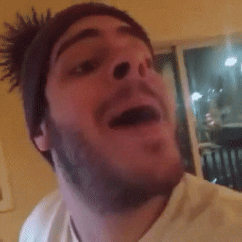 Man in Beanie Making Funny Face