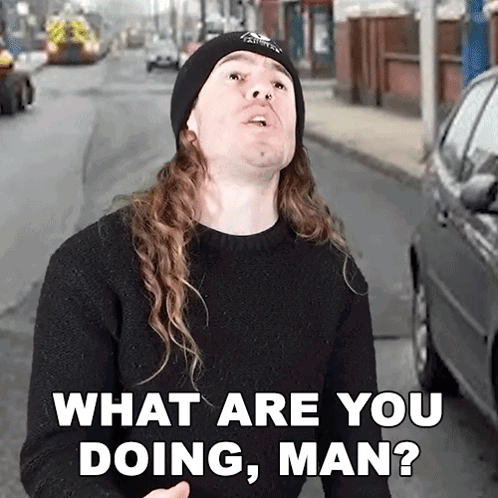 Man in Beanie What Are You Doing Man