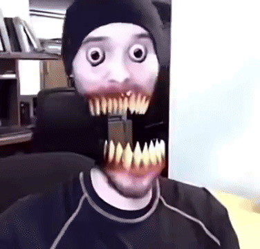 Man in Beanie With Monster Mouth Mask