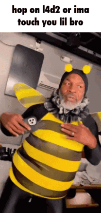 Man In Bee Costume Holding Chest GIF