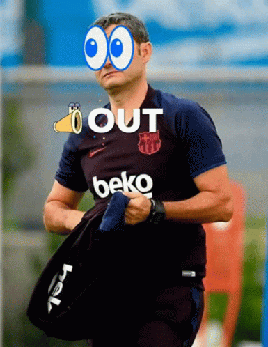 Man in Beko Shirt Walking in Field