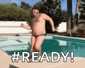 Man in Bikini Jumping Into Swimming Pool