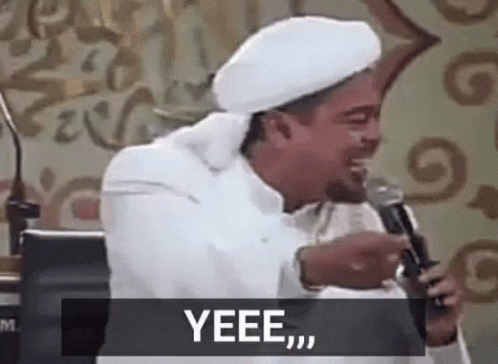 Man In Black Adidas Jacket Holding Gun GIF