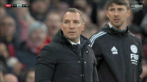 Man In Black Adidas Jacket Next To Another Man GIF