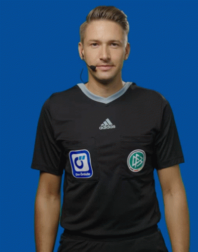 Man in Black Adidas Shirt Das Deutsches Logo