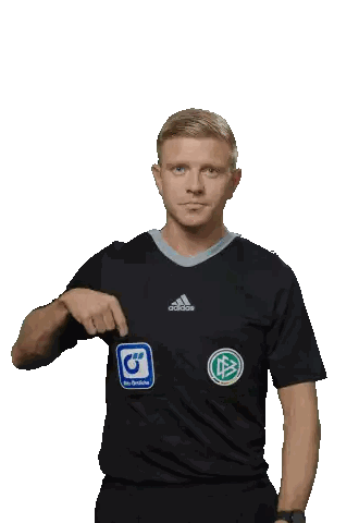 Man in Black Adidas Shirt Holding Yellow Card