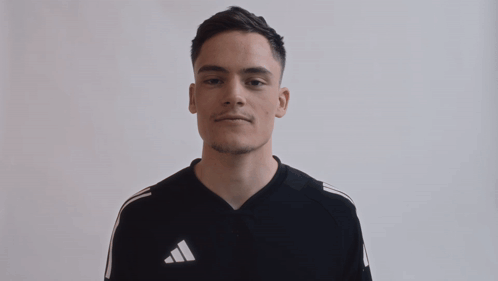 Man In Black Adidas Shirt Making Face GIF