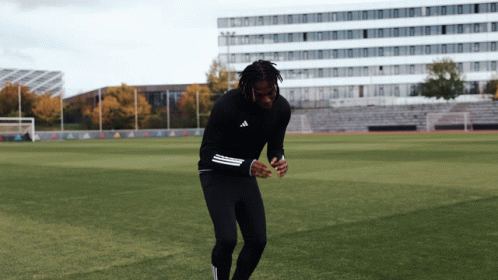 Man In Black Adidas Shirt On Field GIF