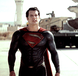 Man In Black And Red Superman Costume GIF