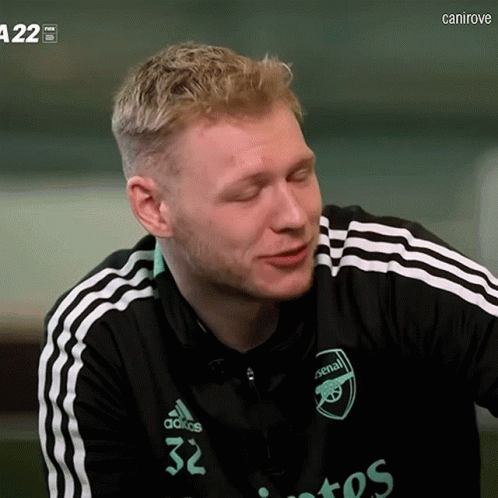 Man in Black and White Adidas Shirt Number 32