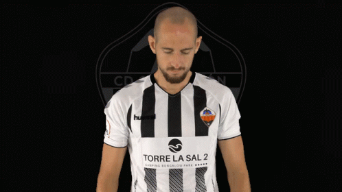 Man in Black and White Striped Shirt Saying Torre Las