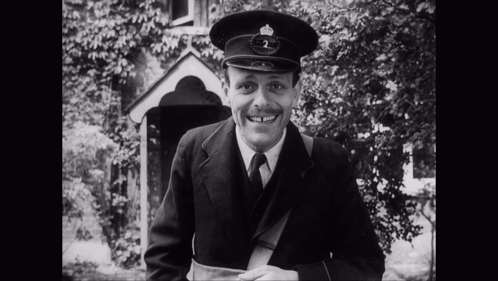 Man in Black and White Uniform With Number 2 on Hat