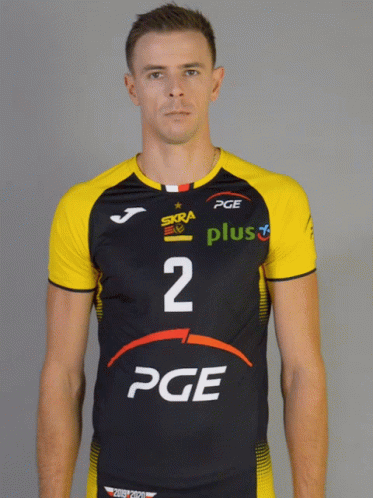 Man in Black and Yellow Jersey With Number 2