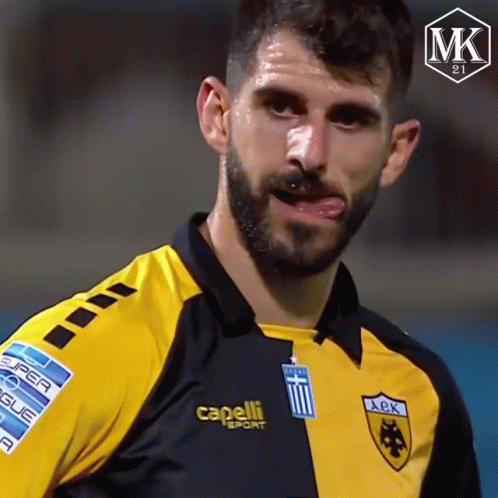 Man In Black And Yellow Shirt Saying Capelli GIF
