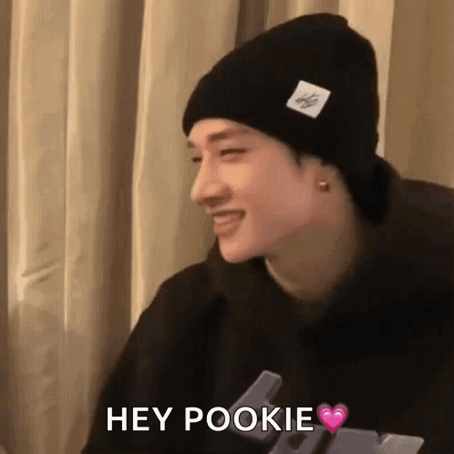 Man in Black Beanie and Hoodie Saying Hey Pookie