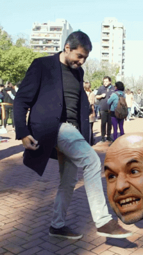 Man In Black Coat Kicks Another Man's Head GIF