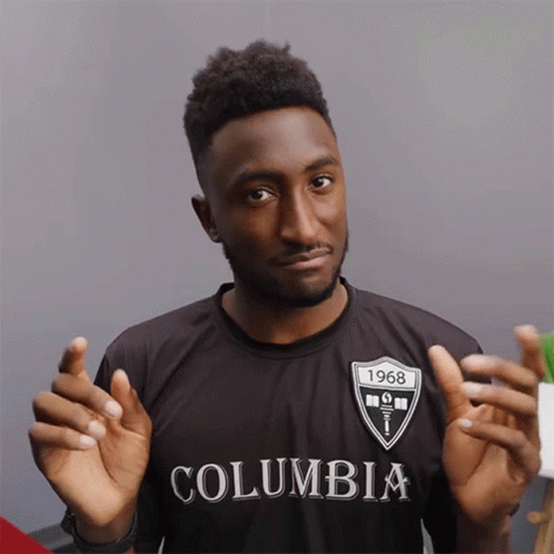 Man in Black Columbia Shirt with 1968