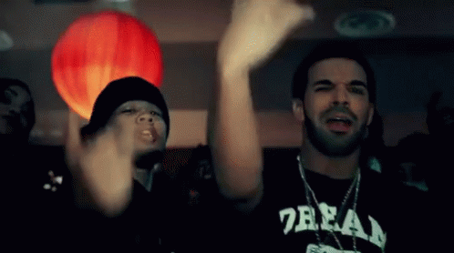 Man In Black Dream Shirt Dancing With Another Man GIF
