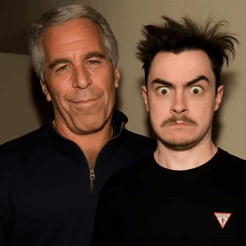 Man in Black Guess Shirt Next to Man with Mustache