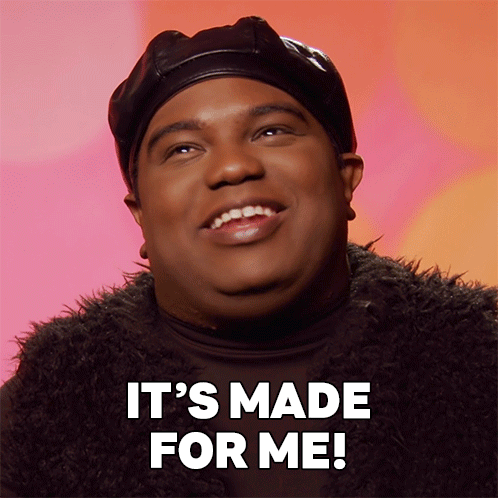 Man In Black Hat And Fur Coat Smiling GIF