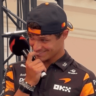 Man in Black Hat and Orange Shirt With DHX