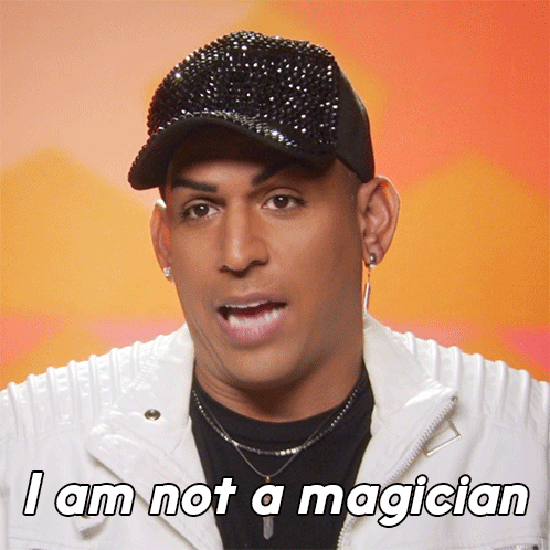 Man in Black Hat and White Jacket Says I Am Not a Magician