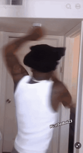 Man in Black Hat and White Tank Top Ig @ Tatubo123