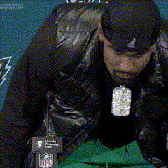 Man in Black Hat at NFL Logo