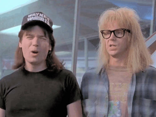 Man in Black Hat Saying Wayne's World