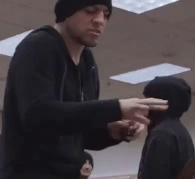 Man in Black Hat Talking