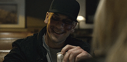 Man in Black Hat With Black Eye and Nose