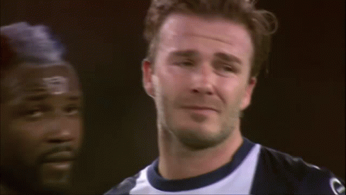 Man in Black Hoodie Holding White and Blue Jersey Saying Tigres