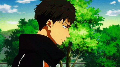 Man in Black Hoodie in Front of Trees