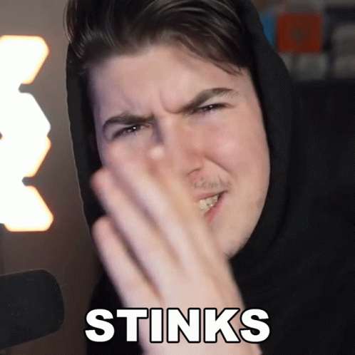 Man In Black Hoodie Making Stinks Sign GIF