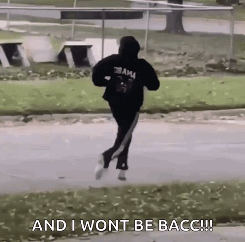 Man in Black Hoodie Running And I Won't Be Bacc