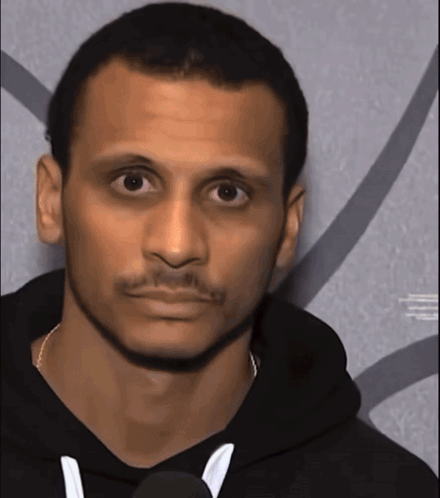 Man in Black Hoodie Serious Look
