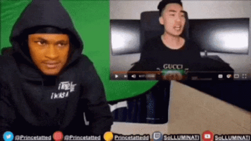 Man in Black Hoodie Watching Video