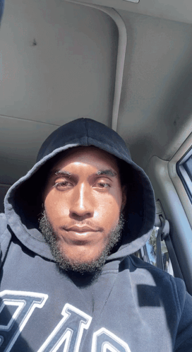 Man in Black Hoodie with A