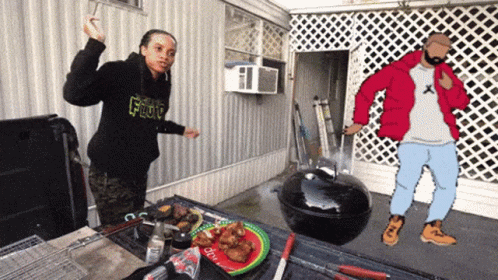 Man In Black Hoodie With Flow Next To Man In Red Jacket GIF