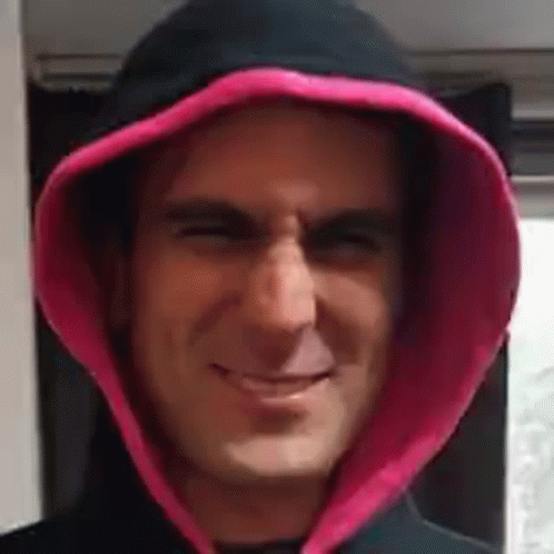 Man In Black Hoodie With Pink Hood Smiling GIF
