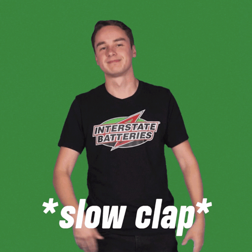 Man in Black Interstate Batteries Shirt